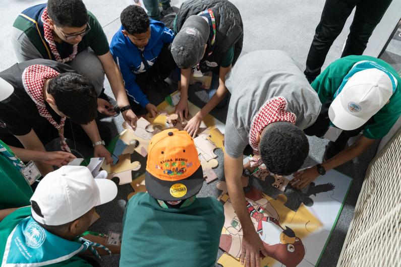 Young people working on puzzles 