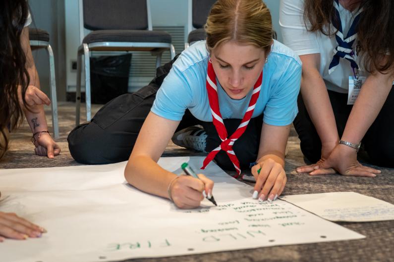A young person working on an activity