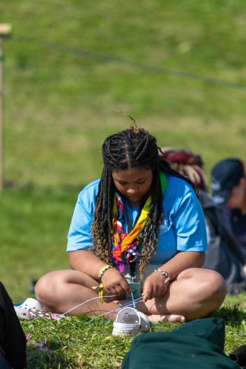 A young person working on a craft