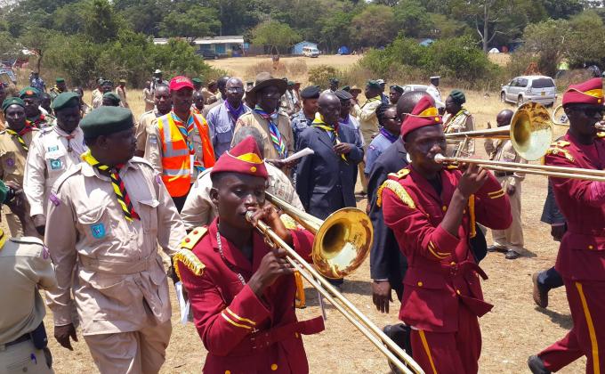 Ugandan Scouts mobilizing people and creating awareness using brass band