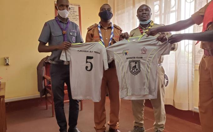 Donation of football materials to Uganda prisons by Uganda scouts