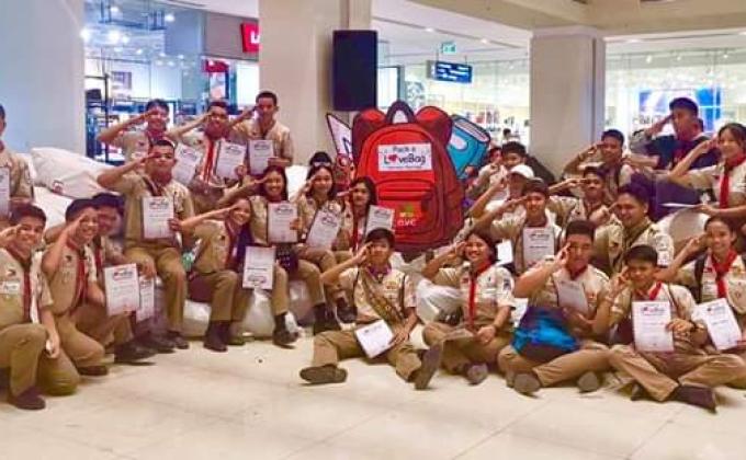 Scouts in the Philippines helps in repacking school supplies for IPs
