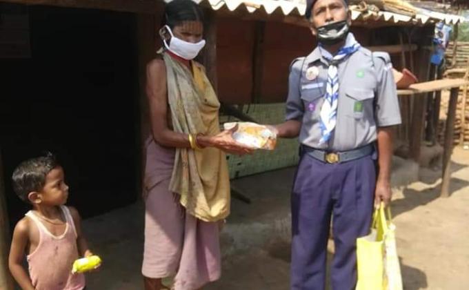 Dry Food, shawl, mask soap distribution and social distance maintain programme was held by Scout troop. 