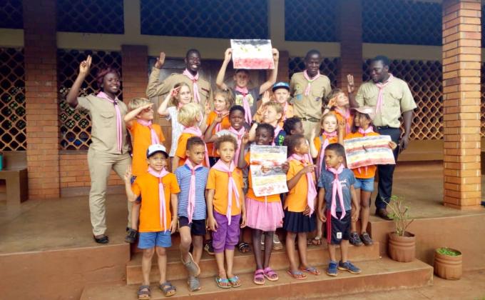jinja Cub scouts share christmas with Local Community.