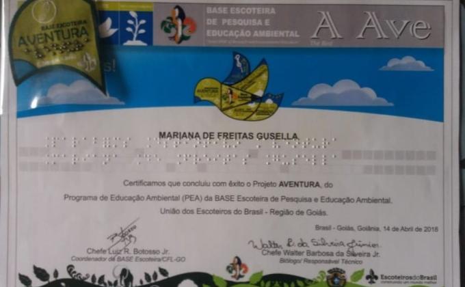 The Blind Cub Scout Mariana will receive the 1st Braille Badge from the Environmental Education Program of the Scout Base 
