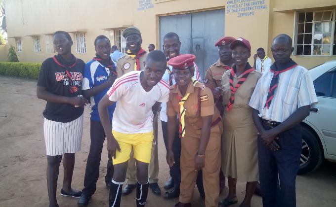 Scouts football club in soroti male prisons win 3:1 aganist ward 13 as the district scout leaders cheer them.