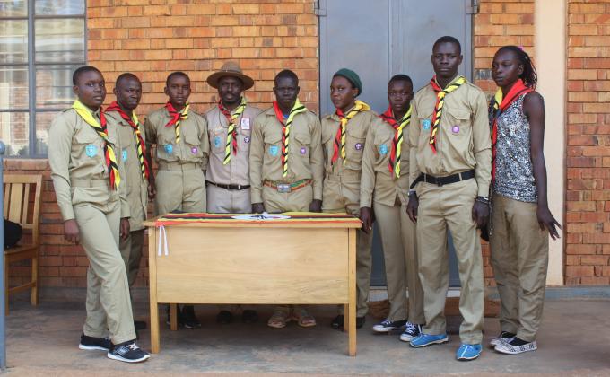 Investituring former street children into scouting  in Uganda 