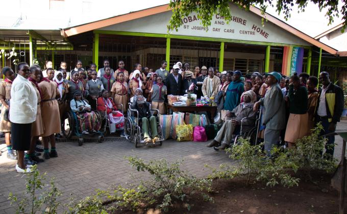 Girl Scouts in Kenya show love to the aged persons at Cheshire Home for the Aged