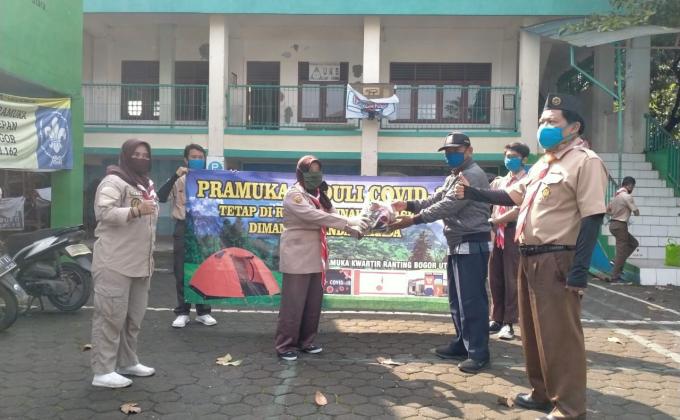 The Scout Cares (Pramuka Peduli) of North Bogor District Council - Bogor City Regency Council - West Java - PSBB (Large-scale Social Distancing) Socialization and Distribution of 1500 Masks