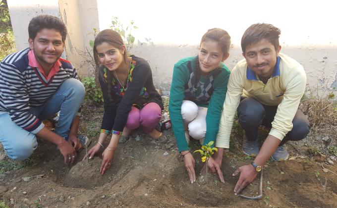 Making our campus green... by planting trees .