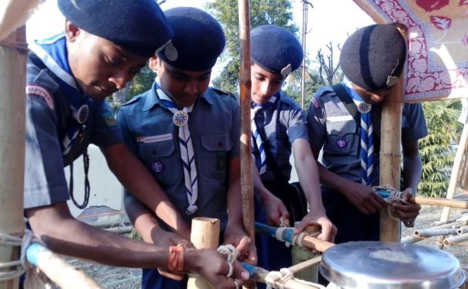Helping my scout brother in Pioneering project & teaching lashing