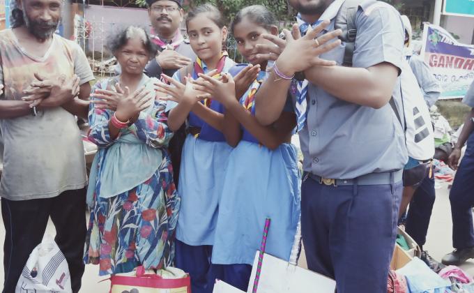  Distribution of clothes and food to needy people. 