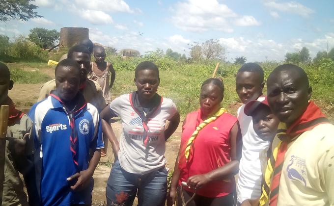 Soroti scouts cleanup Asayo spring well in Nakatunya cell for safe water