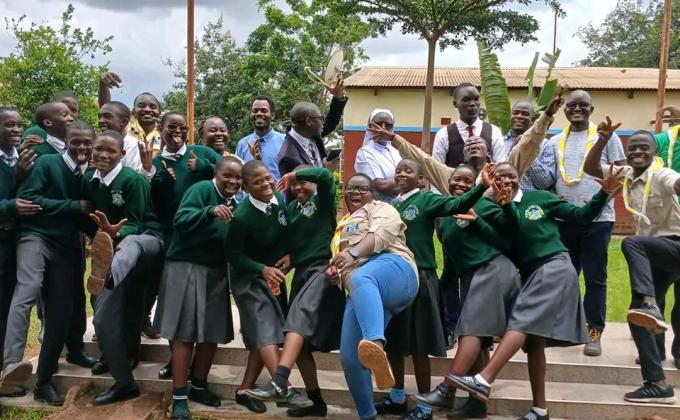 Students, teachers and Scouts after planting fruit trees at Bishop Patrick Kalilombe Catholic High School in Dowa District.