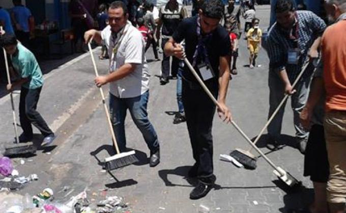 الكشافة الفلسطينية في غزة تقوم بخدمة مراكز الايواء اثر الحرب على غزة 