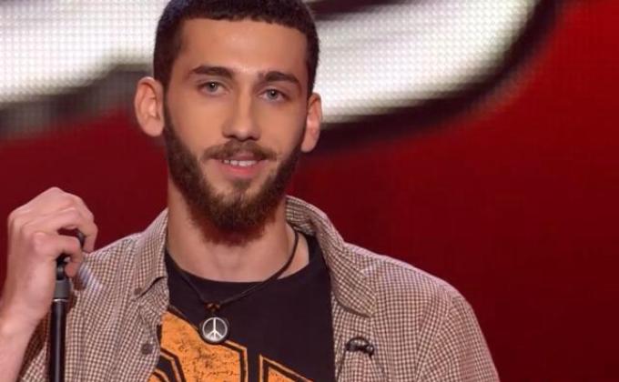Rovshan Bayramov - a  member of Scout of Azerbaijan at the Contest "The Voice of Azerbaijan "