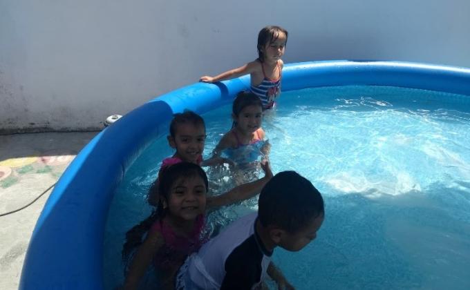 SWIMMING CLASSES TO A COMMUNITY