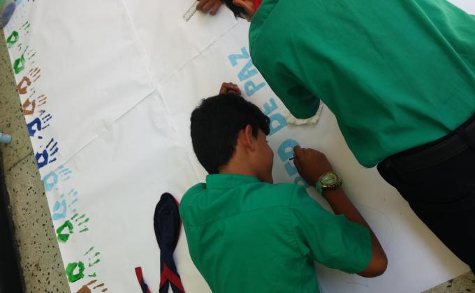 Cartelera Permanente sobre el Grupo Scout Aldebaran diciéndole Alto al Bullying.