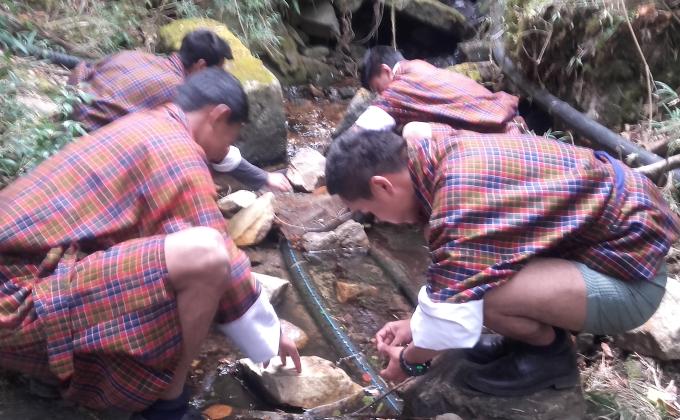 Water Source cleaning for the School and Community