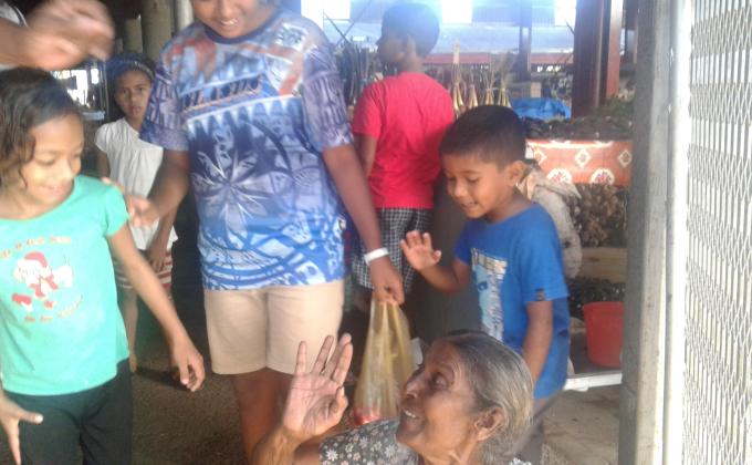 Hands and Feet Project - Feeding people in streets.