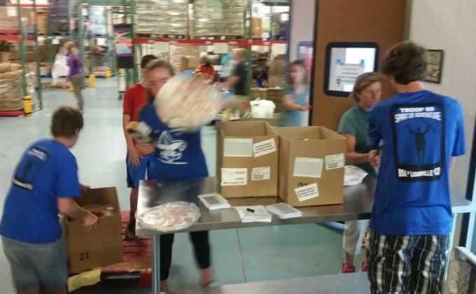 Community Food Share prep for family pickup