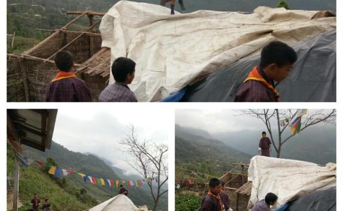 Covering the house roof after blown by the strong wind.