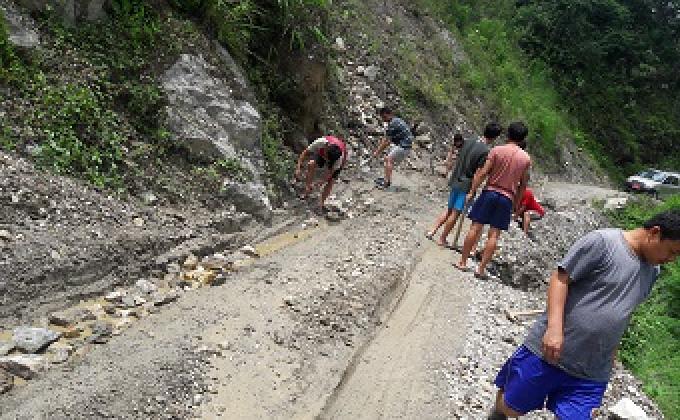 community services in clearing monsoon road block.