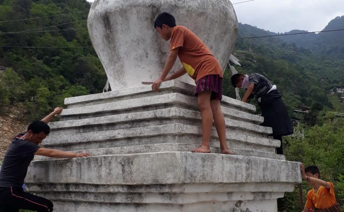 Peace through white washing of religious chorten