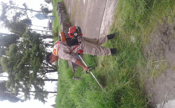 Grass cutting near the Hostel Premises (Chukha Central School)