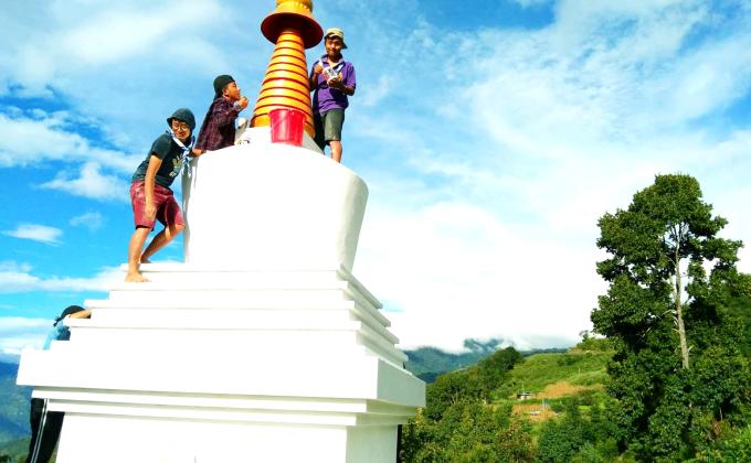Making beautiful things happen .White washing of stupas.