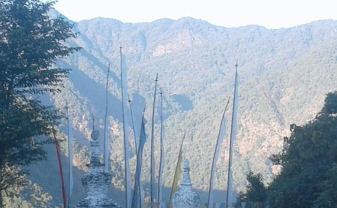 White washing of chorten  (stupa)