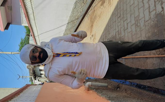 कोरोना महामारी से निपटने के लिये किया गाँव को सेनेटाइज 