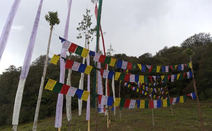 Eracting of prayer flags.