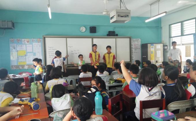 Helping to teach scout to the primary school students