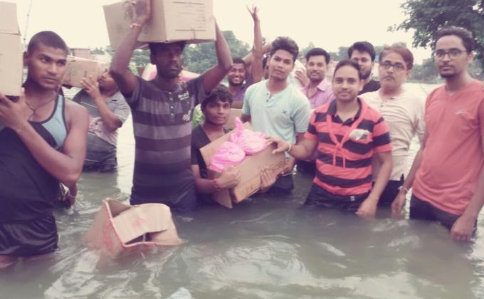 Food for flood peoples by mop coordinator ,scouts and social peoples 