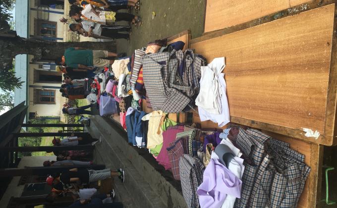 Distribution of jumbled clothes and gifting the teaching aids 