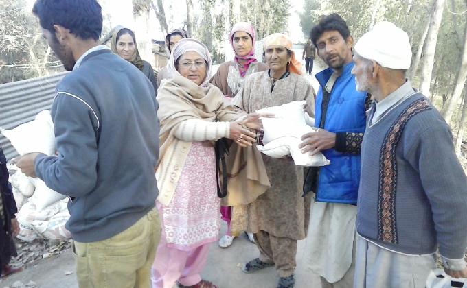 Relief Distribution after flood for flood affected families at Kashmir valley.