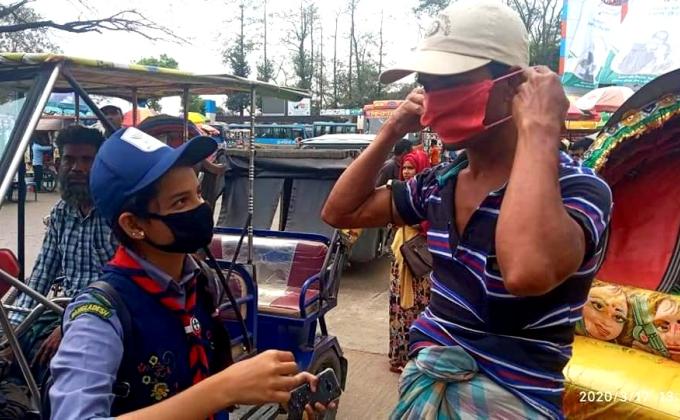 করোনা ভাইরাসের সংক্রমণ নিয়ন্ত্রণের সচতেনতা জন্য কাজ করছে স্কাউটরা..!