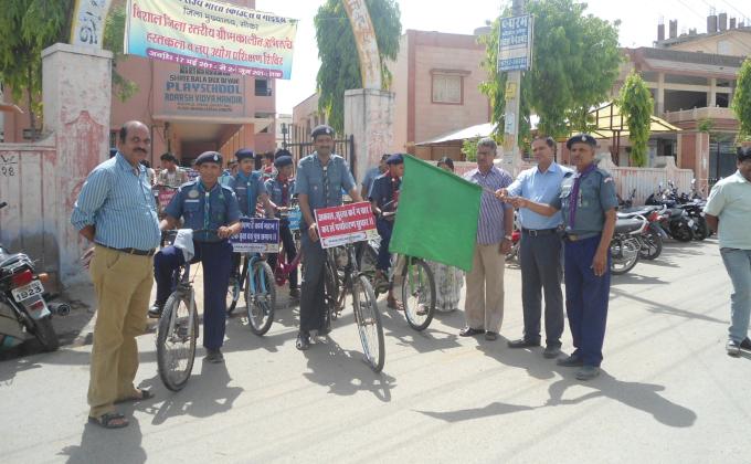 Eco-Club members and Scout Guide Bicycle rally under the Environment Week