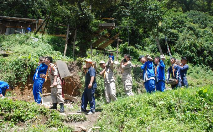 Bhutan Scouts: No job too big or small, Community service helps all.