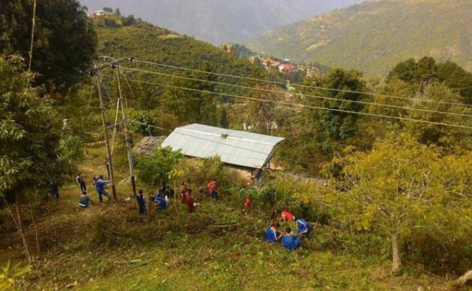 Cleaning around the lhakhang