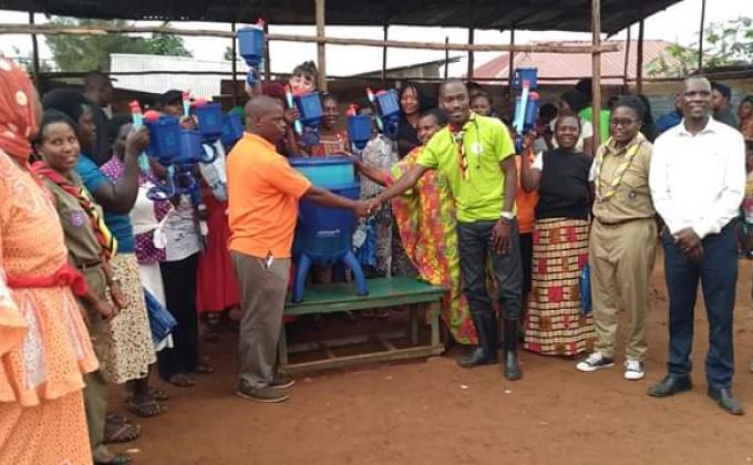 Uganda Scouts donate water filters to communities to improve water safety.