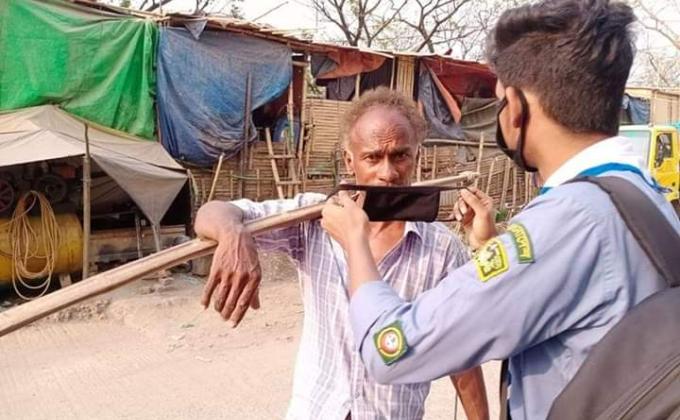 কোরোনা ভাইরাসের জন্য সচেতনতা ও মাক্স বিতরণ 