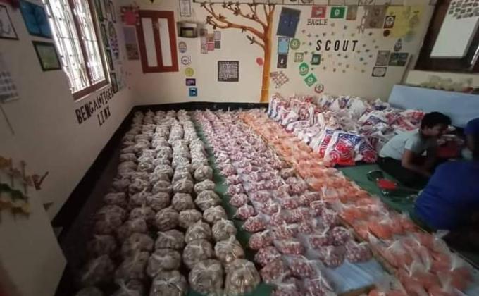 Distribution of food among the poor people