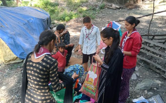 Provide clothes to needy people in slum