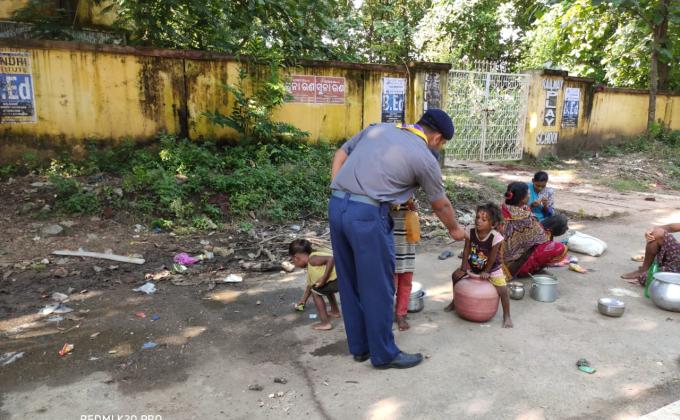 Biscuit packet Distribution to needy