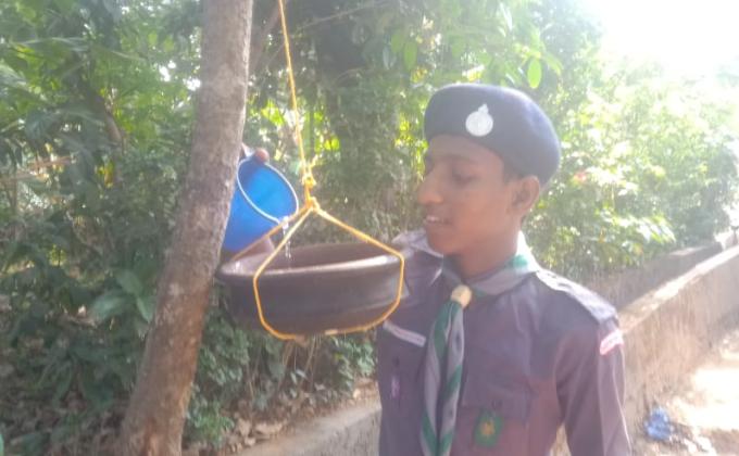 an earthen pot for thirsty birds 