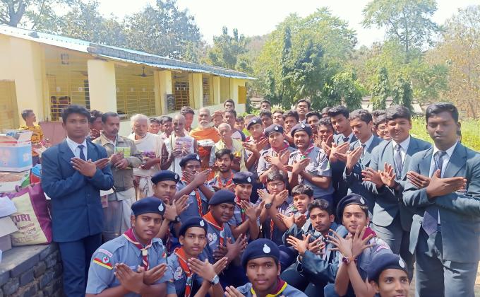 Distribution of food and clothes an orphanage 