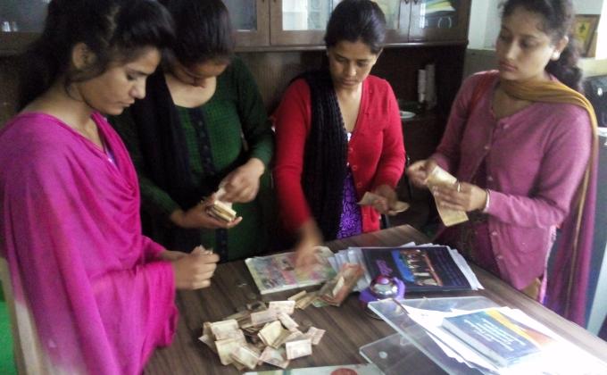 Project- "SAMARTH"- Part-IX, Counting donation/ checking the clothes collected by Rover Ranger unit ( Celebrating International Peace Month-Sept 2015)