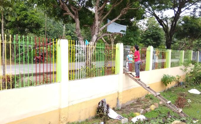 PAINTING OF SCHOOL FENCE